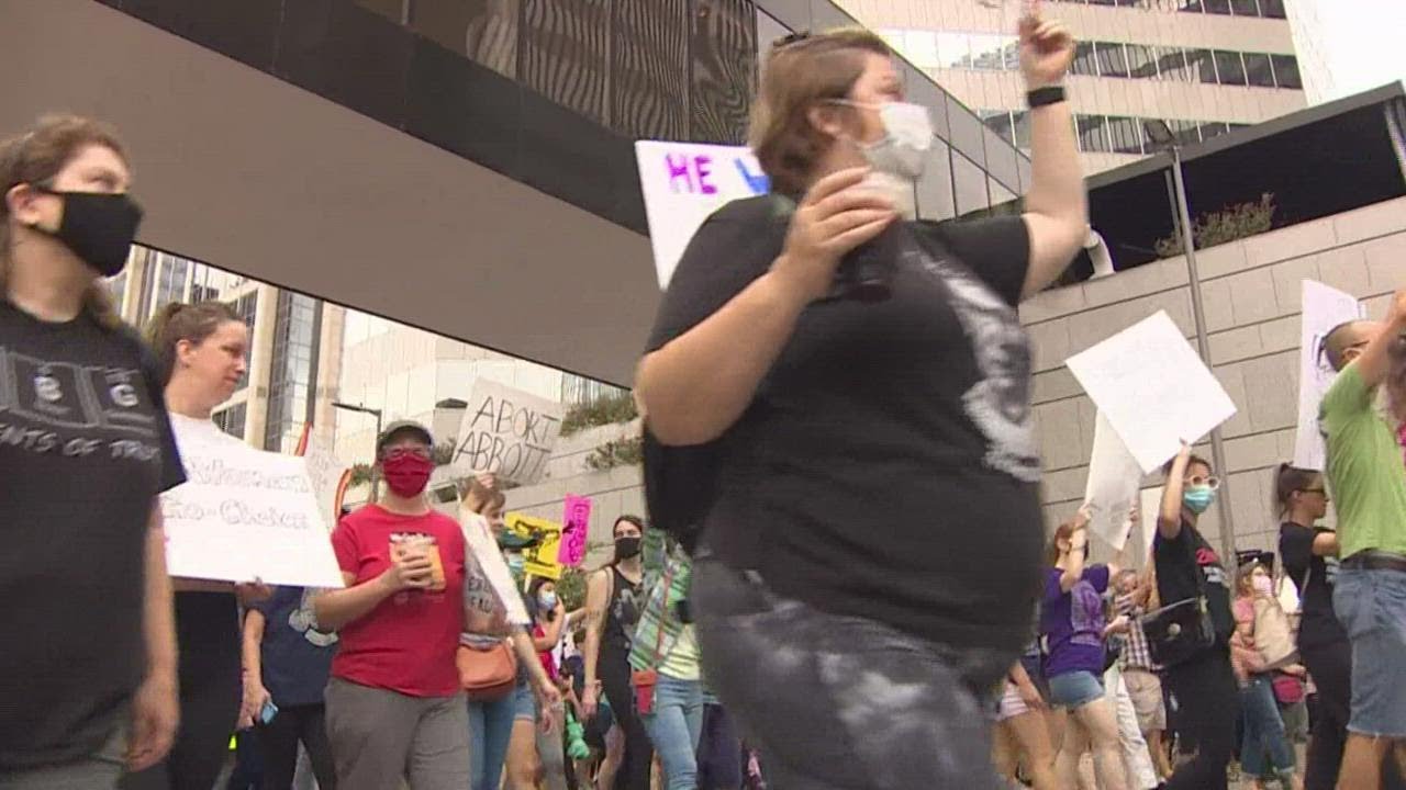 Thousands protest Texas abortion law during Women's March in downtown Houston