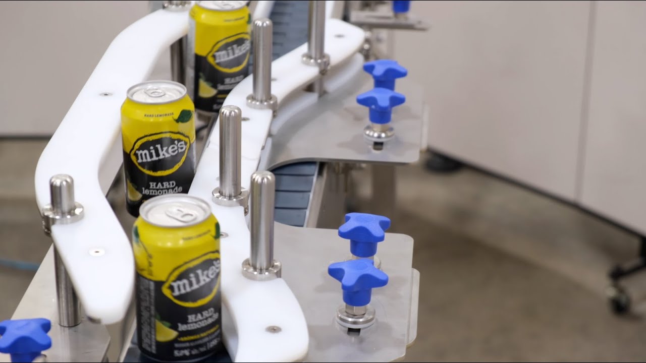 Galick Packaging Adjustable Conveyor Rail Bump Out for Bottom Coding on Existing Conveyor Systems