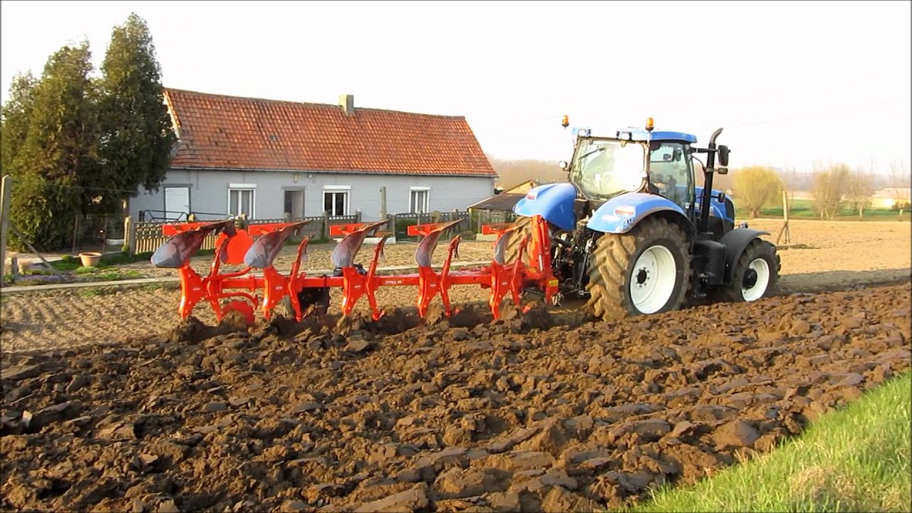 New Holland T7.185 with Kuhn Vari-master 122