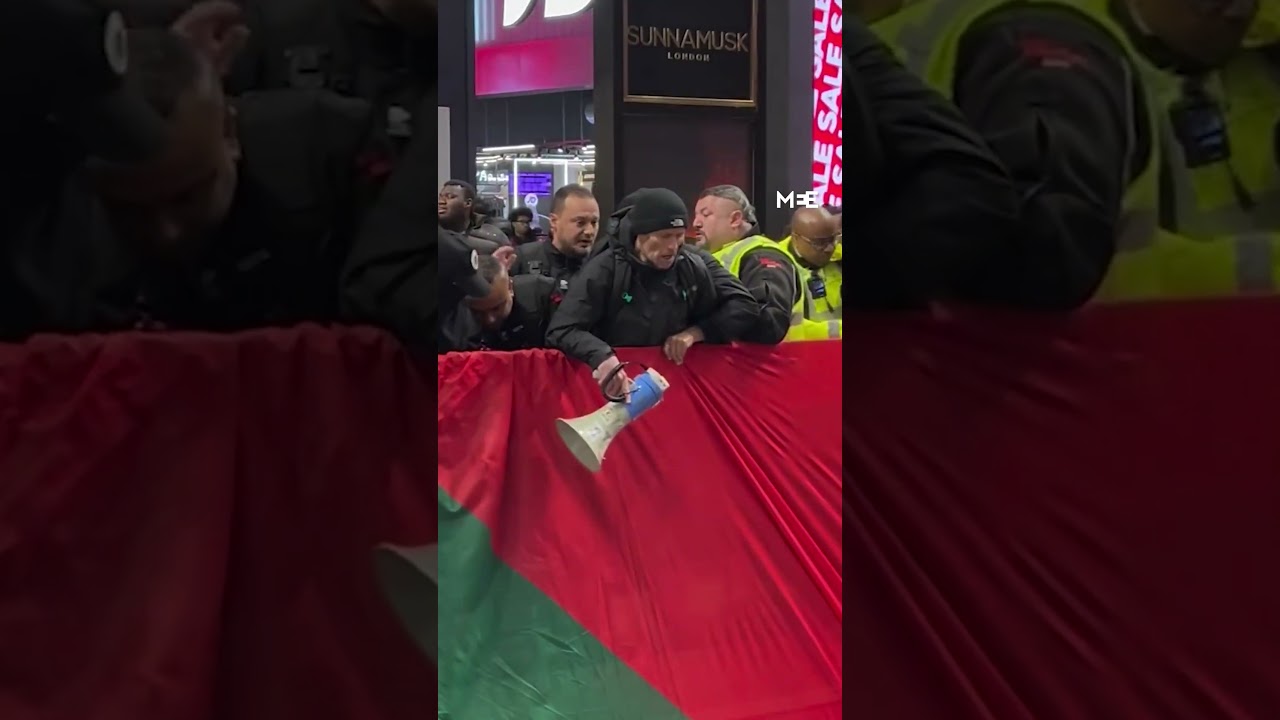 Giant Palestinian flag unfurled at Westfield Stratford during protest