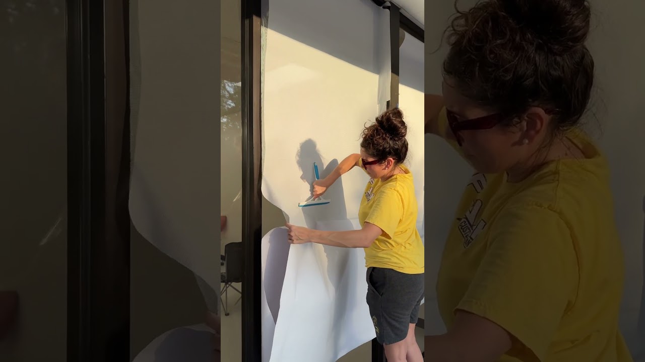How to apply perforated vinyl to store windows 