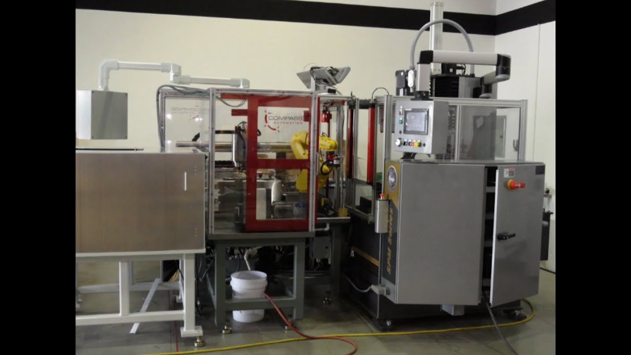 Robotic System for Cleaning & Inspecting Machined Automotive Parts - Compass Automation