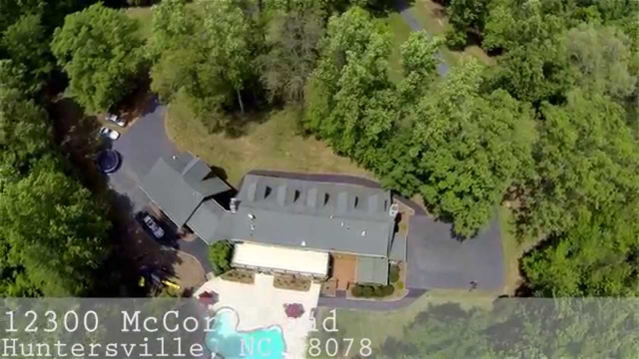 Aerial Footage of 11 acre Log Home Estate at 12300 McCord Rd