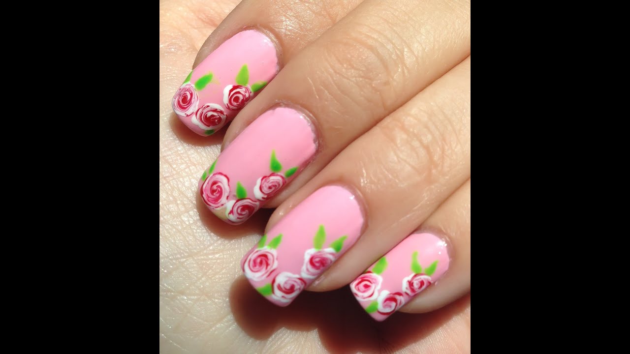 Facil diseño de uñas con rosas blancas y rojas
