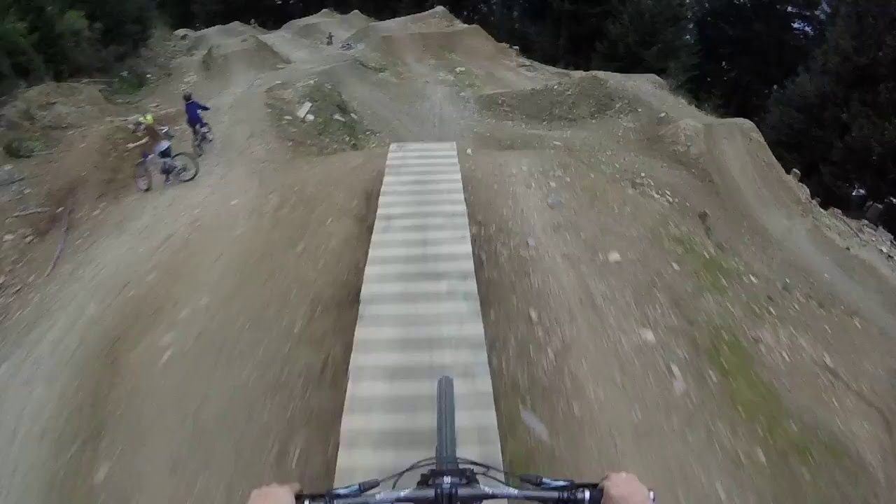 Peter Rowe Biking - Hitting the big jump line on Wynyard