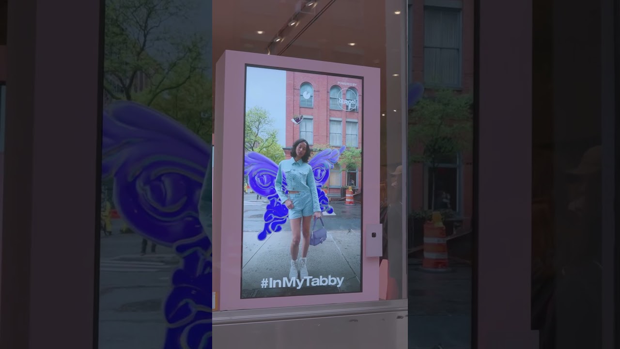 Augmented Reality Mirror Takes Over Coach Storefront Window!