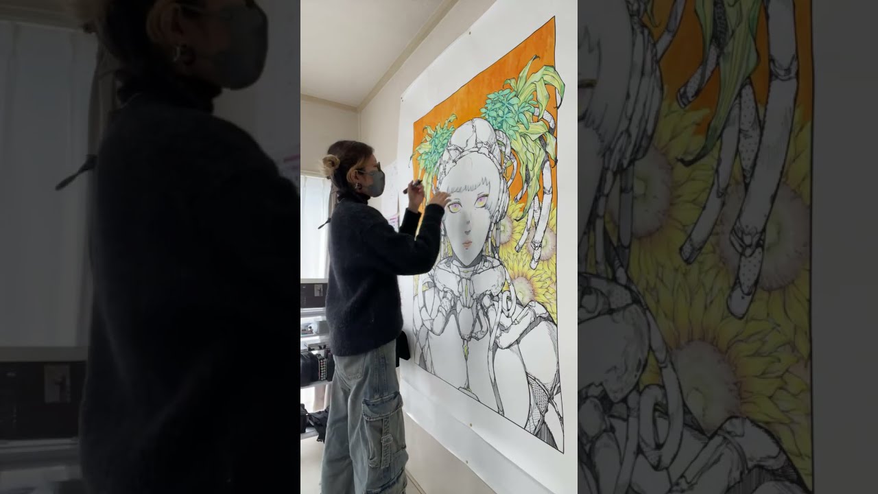 大きい絵を仕上げてる人