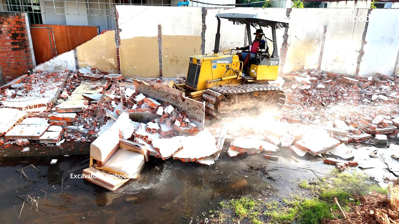 Good Action Very Good Bulldozer Working Pushing Fragments Home And Pour Stone Size 10 X 20 Meter
