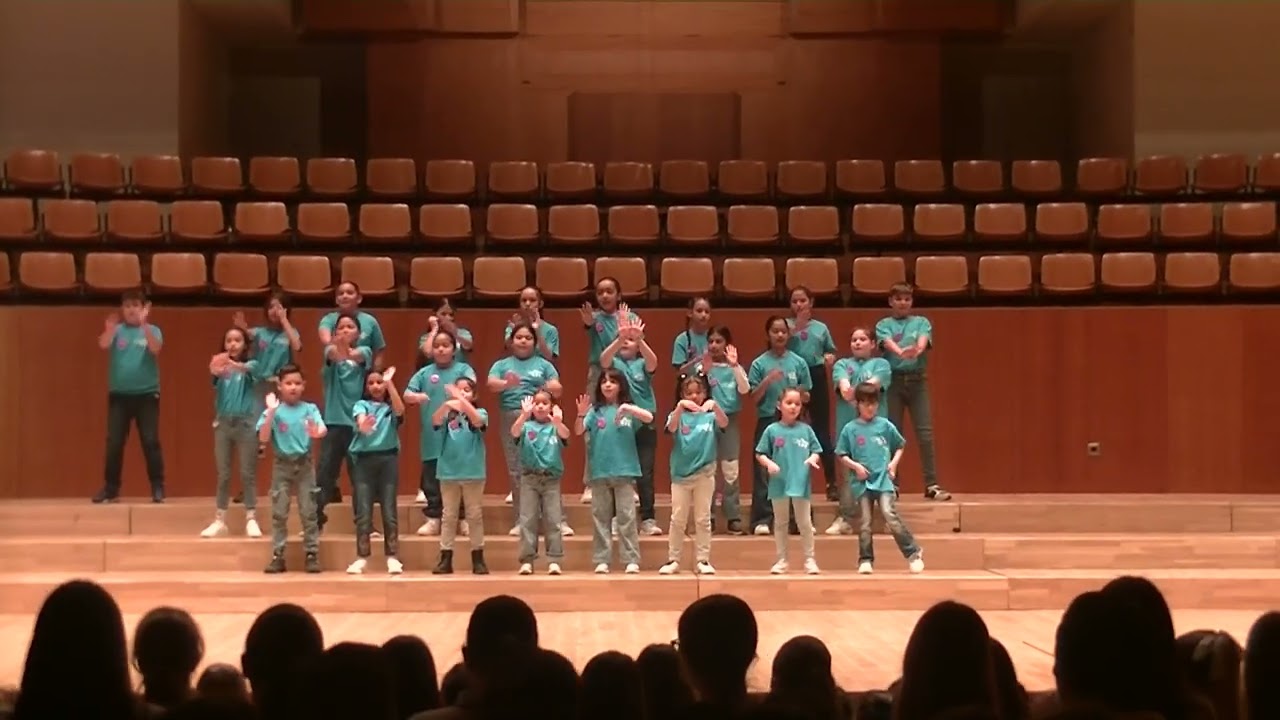 Fem escola, fem ciutat - Cantada por todos los coros en el Palau