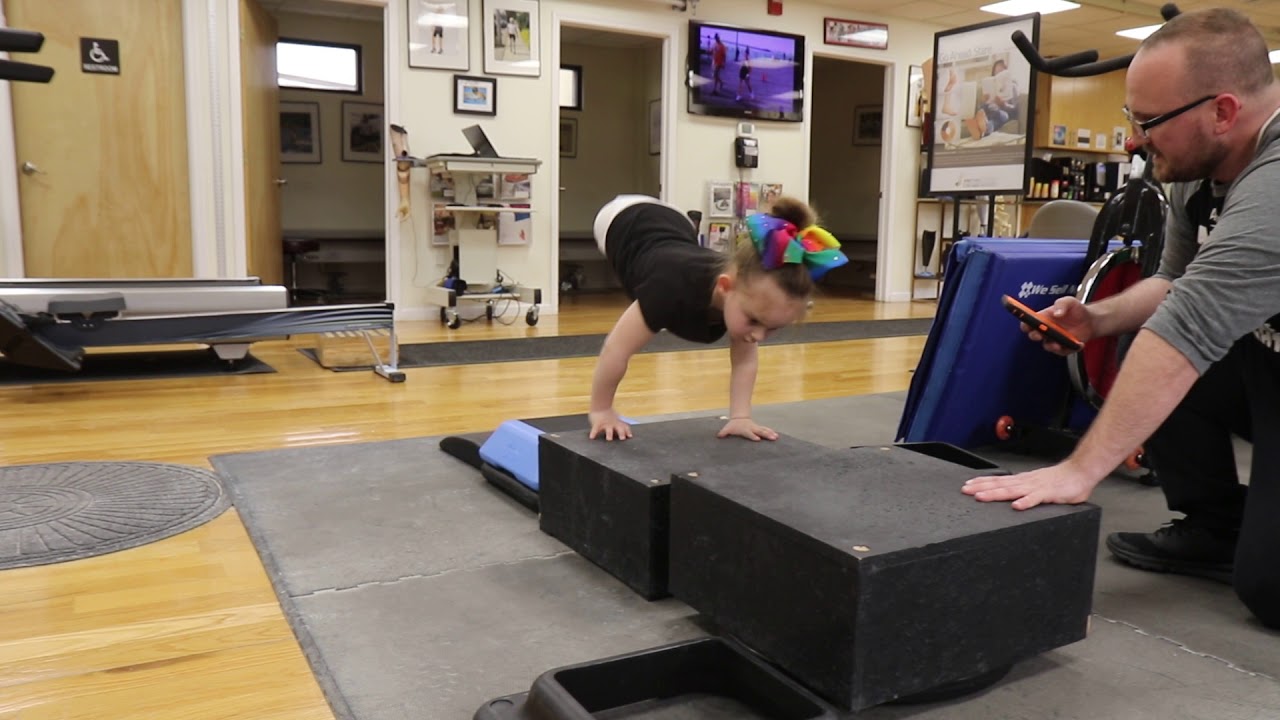 6 year old Paige, a bilateral hemipelvectomy amputee doing CrossFit