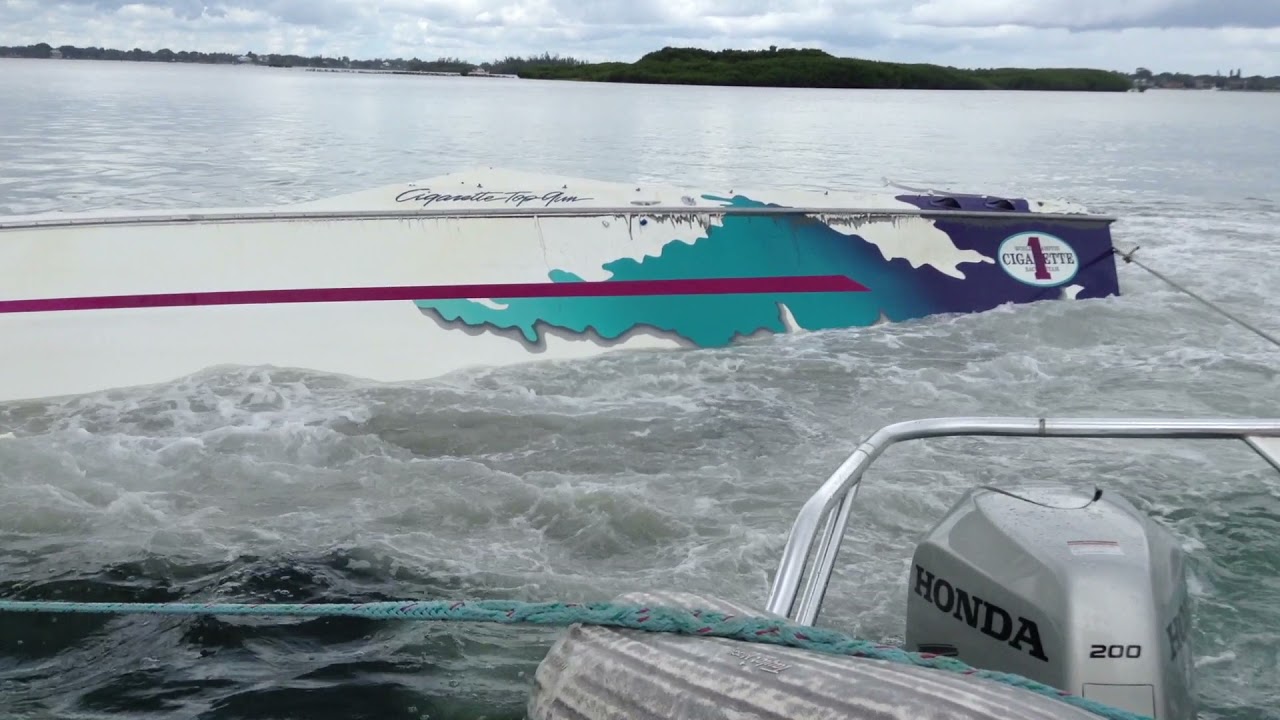 Old cigarette boat salvage with retriever