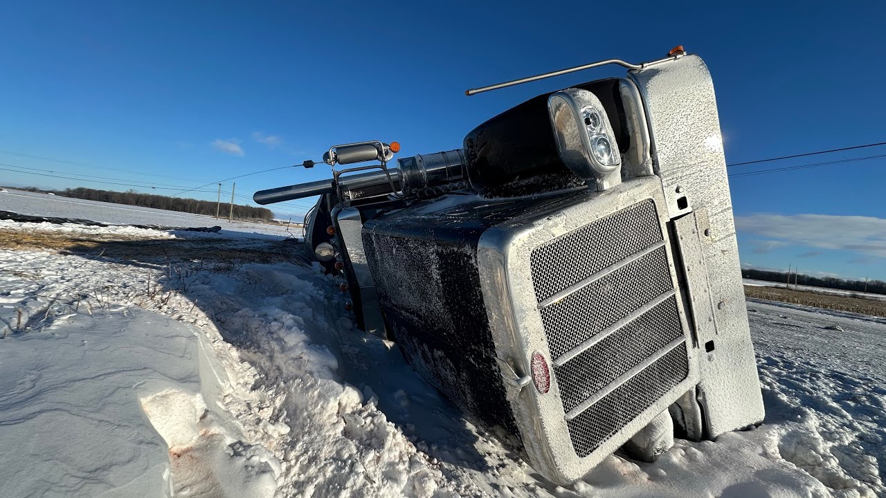 ROLLOVER !!!!! PETERBILT TRUCK FLIPS IN INTENSE BLIZZARD CONDITIONS !!!!