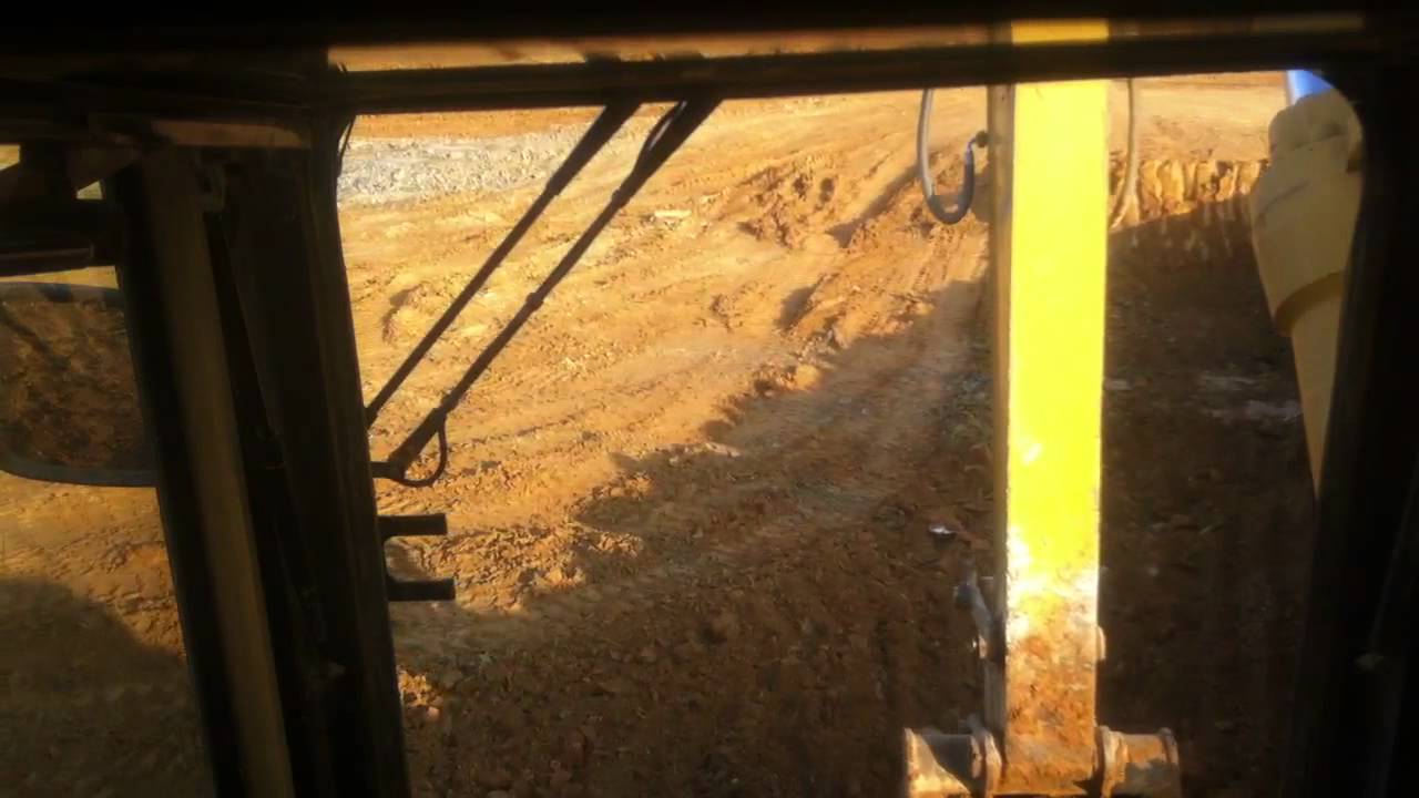 330BL loading cat 740