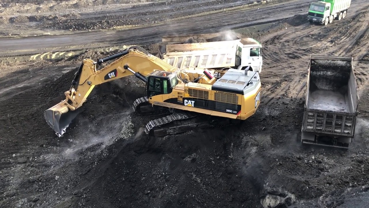 Caterpillar 385C Excavator Loading Coal On Trucks - Labrianidis Mining Works