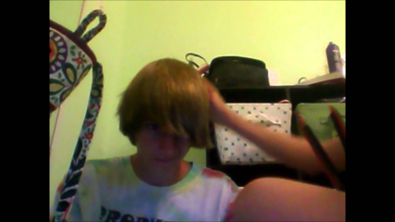 Flat Ironing my brothers hair!(: