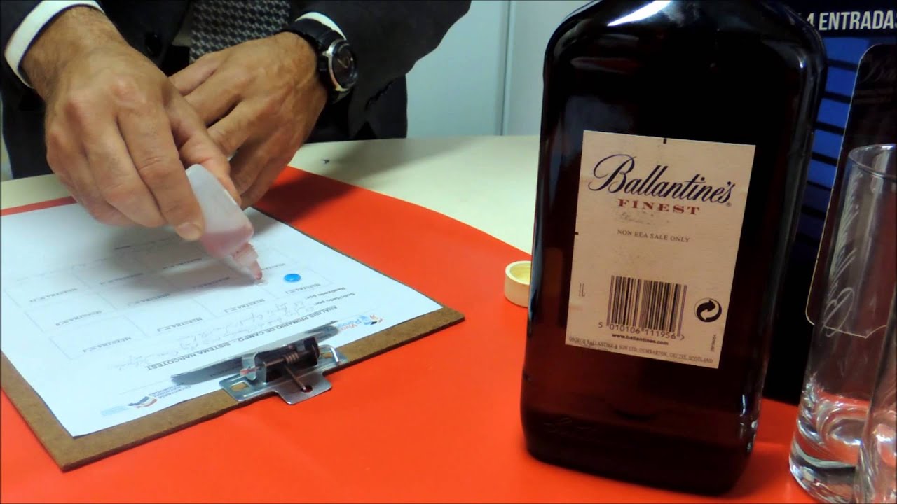 Tráfico de COCAÍNA en botella de Whisky