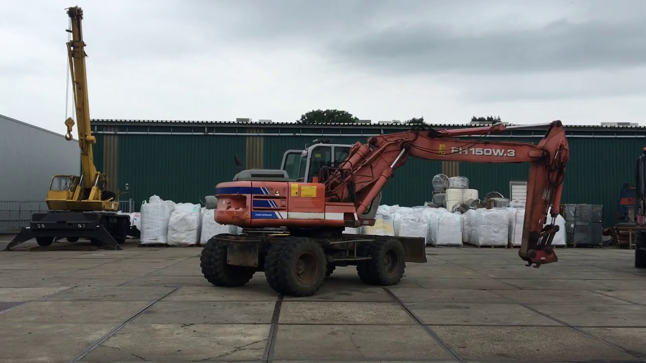Колёсный экскаватор. Hitachi FH150W.3 (1998 Год)