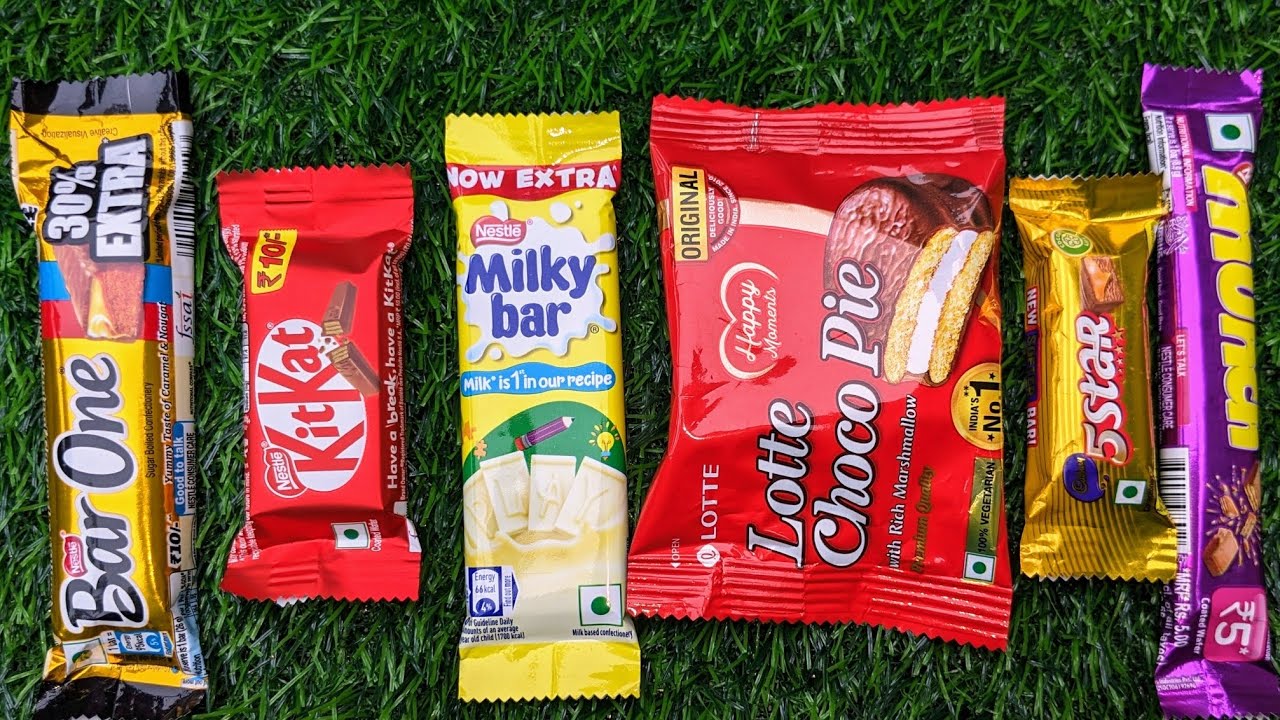 Lots of chocolate Munch Dairy milk chocolate MilkyBar Chocolate Perk Chocolate Crispello vs KitKat