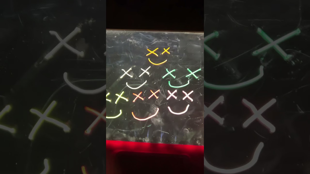 Colors of X eye and smiley face from Suntide squad ￼￼