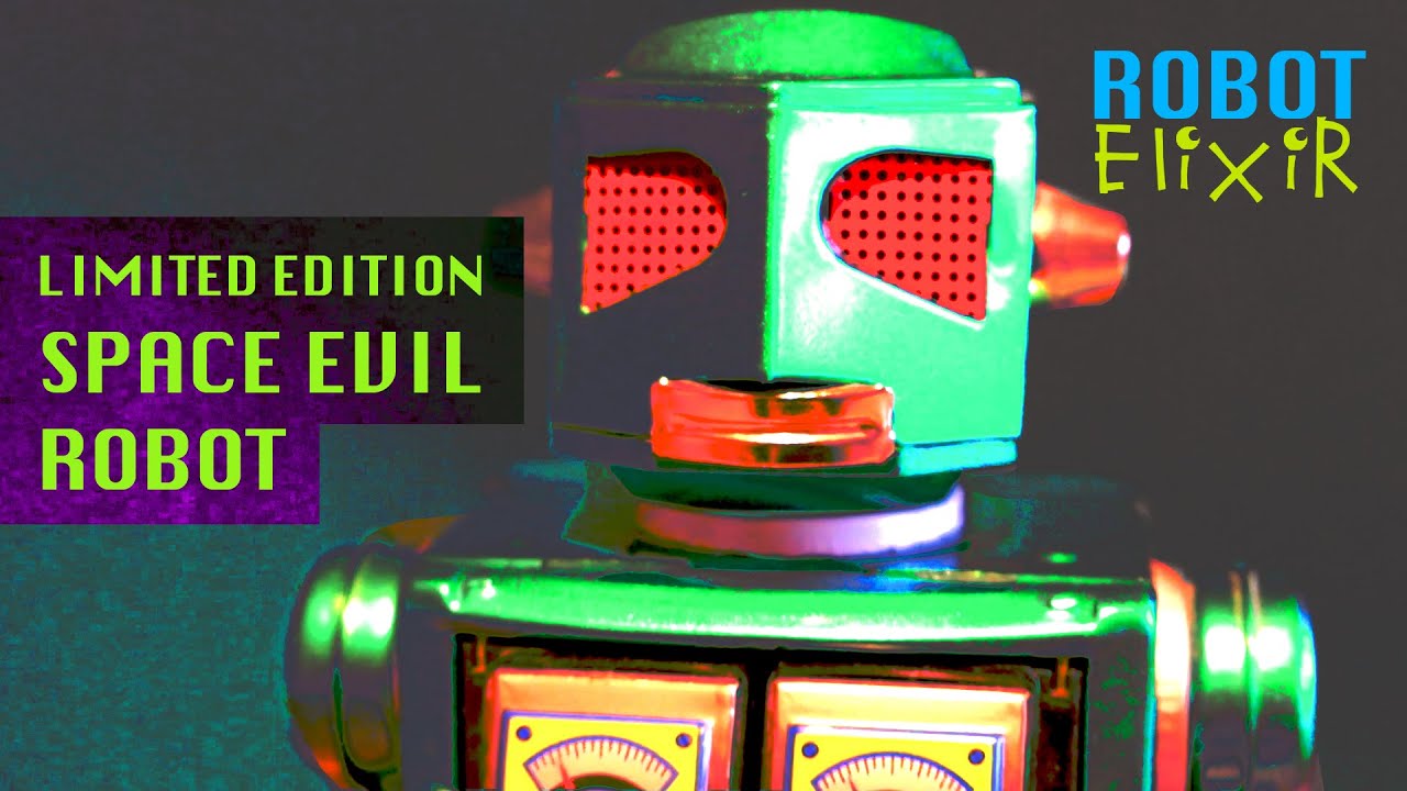 Space Evil Robot - Rare metallic green tinrobot from Metal House Japan. Tinplate robot toy