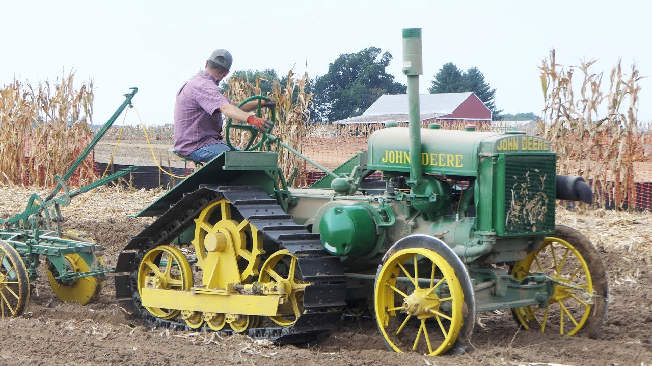 Vintage Tractors in The Field Plowing