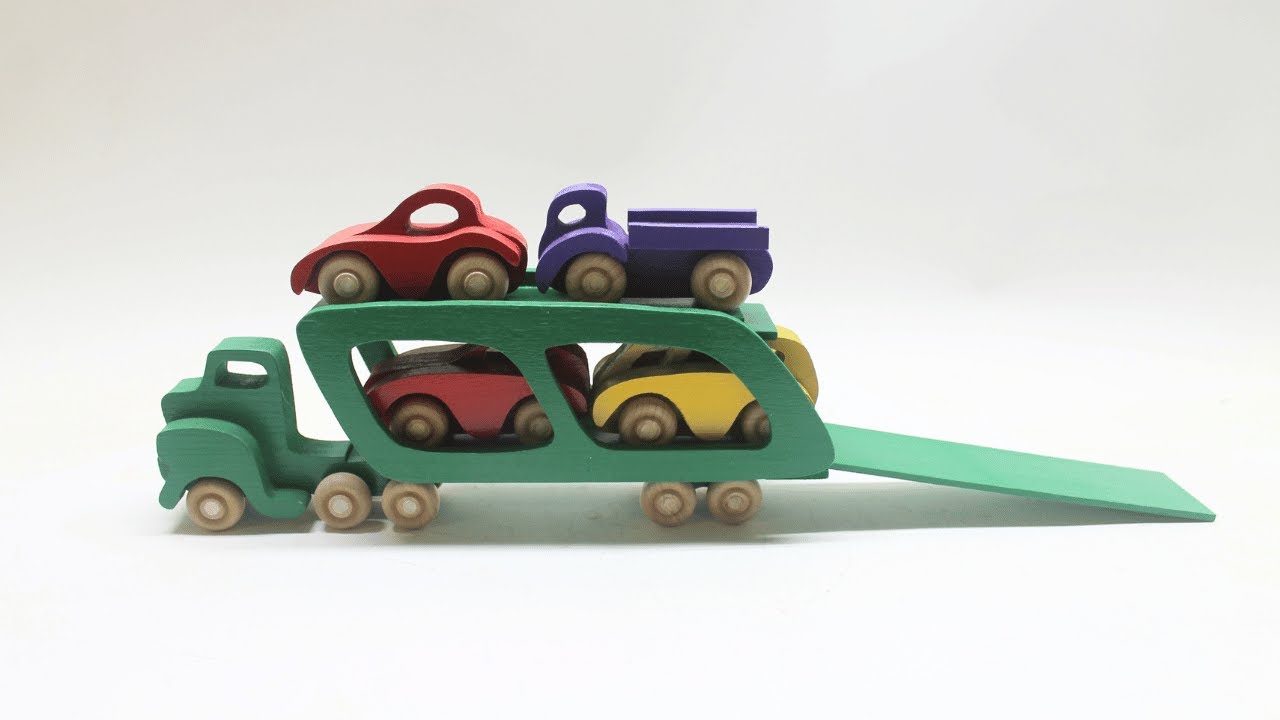 What's better than a wooden toy truck? A car carrier truck with four cars.