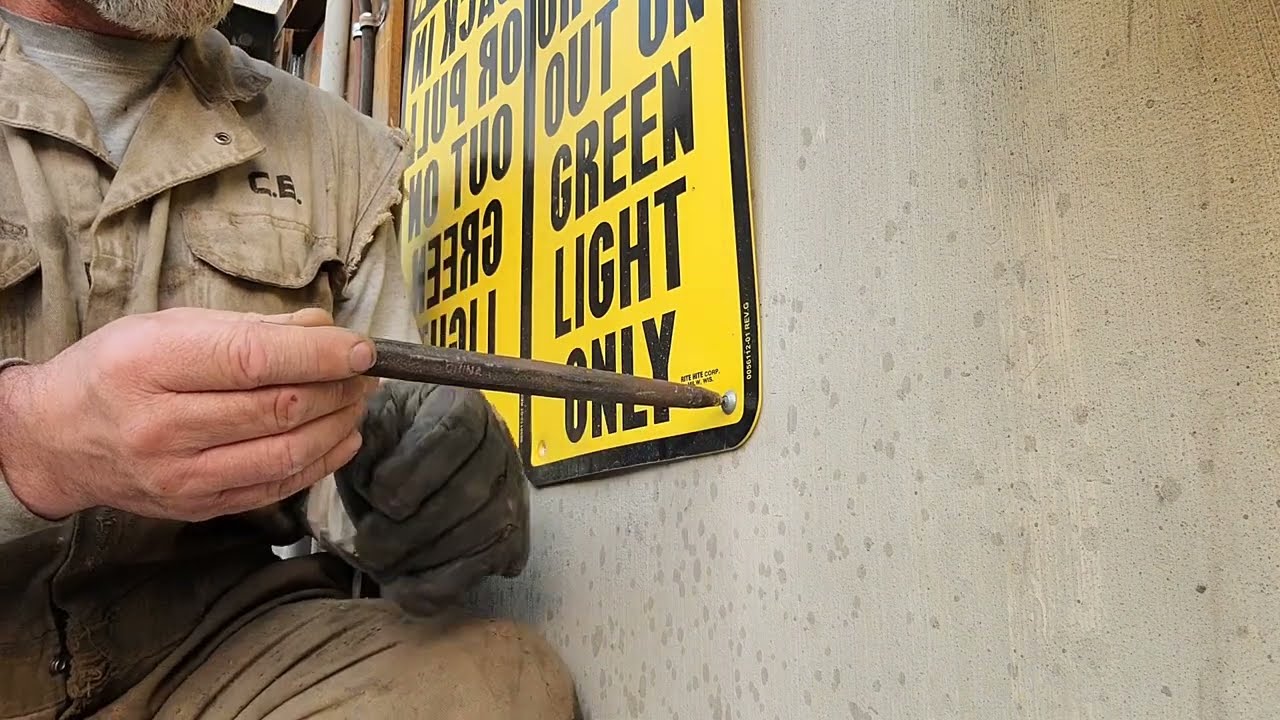 Removing a cobra drive or nail drive anchor from a concrete wall