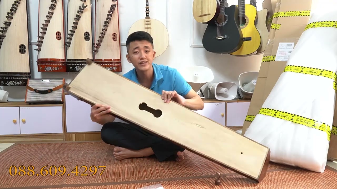 Có nên mua 1 cây đàn tranh giá rẻ cho người mới tập chơi