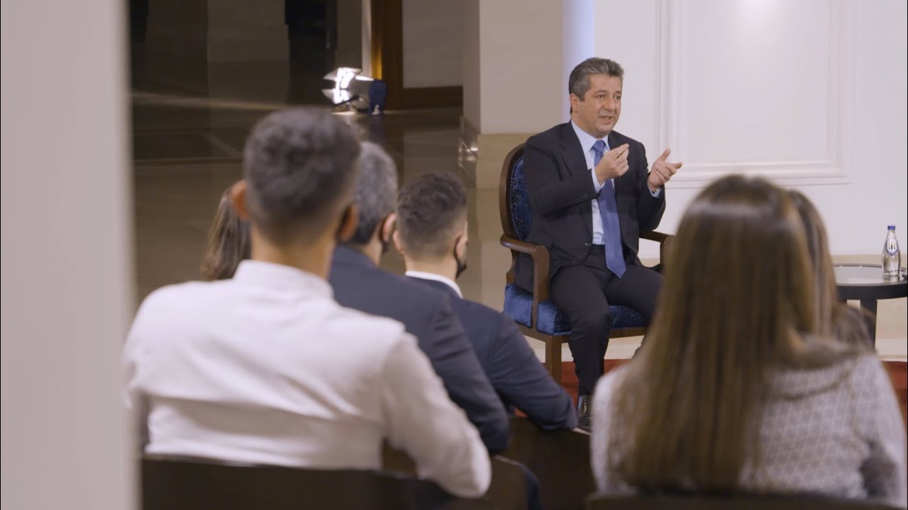 Prime Minister Masrour Barzani speaks to students at the first Town Hall Meeting