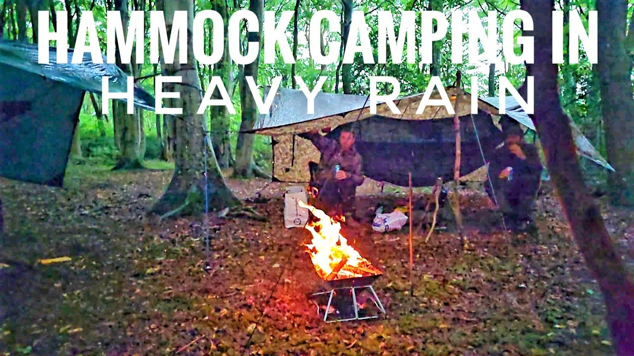 Hammock camping in heavy rain. DD 4x4 multicam tarp.