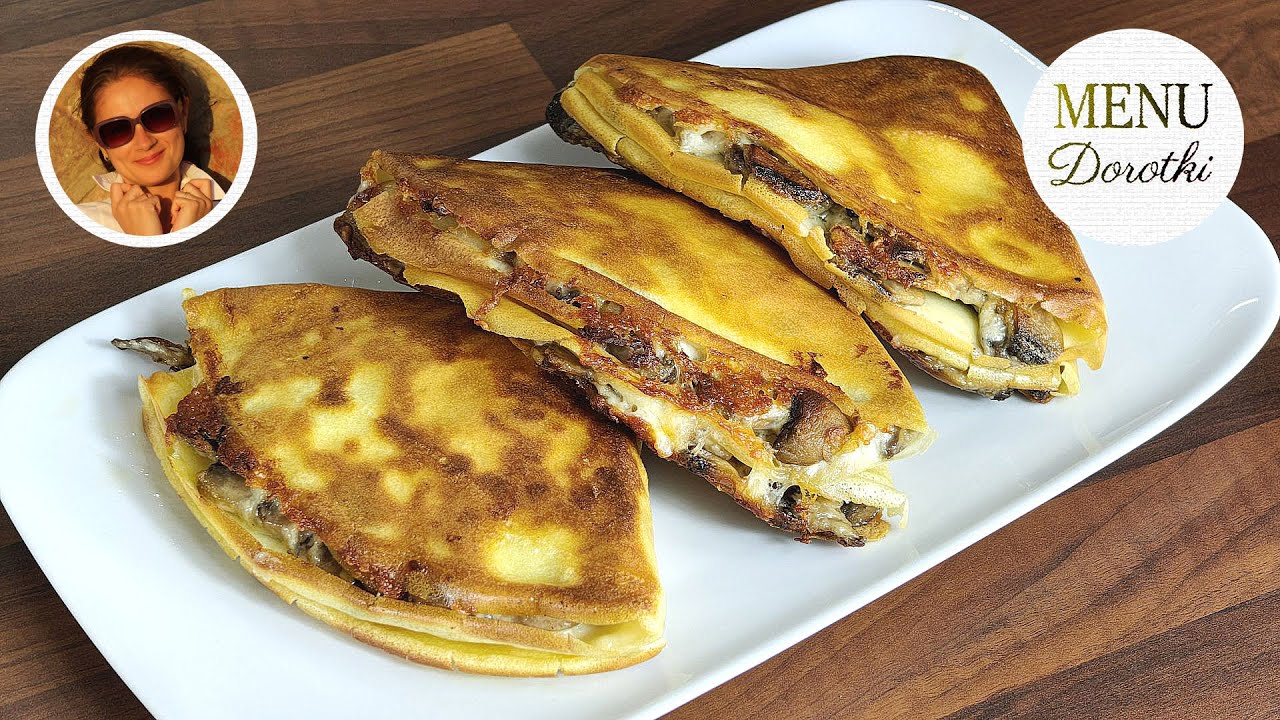 Chrupiące naleśniki z kremowym i aromatycznym farszem z pieczarek i sera. Przepis MENU Dorotki.