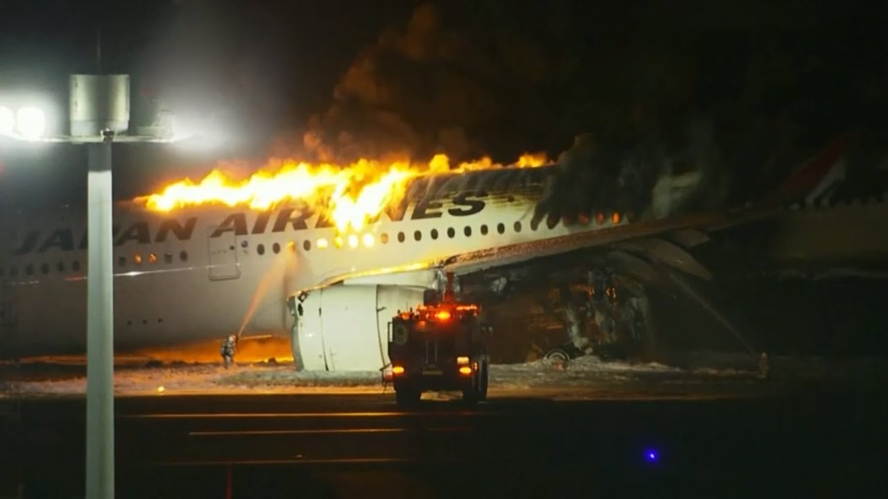 Live: Fire breaks out in plane on runway at Japan's Tokyo Haneda airport