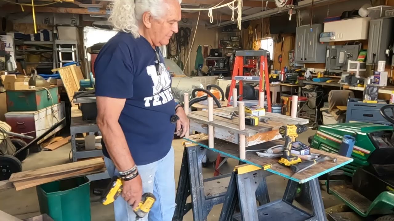 Finishing up the pond dock, planks, pilings, hand rails and the finish.