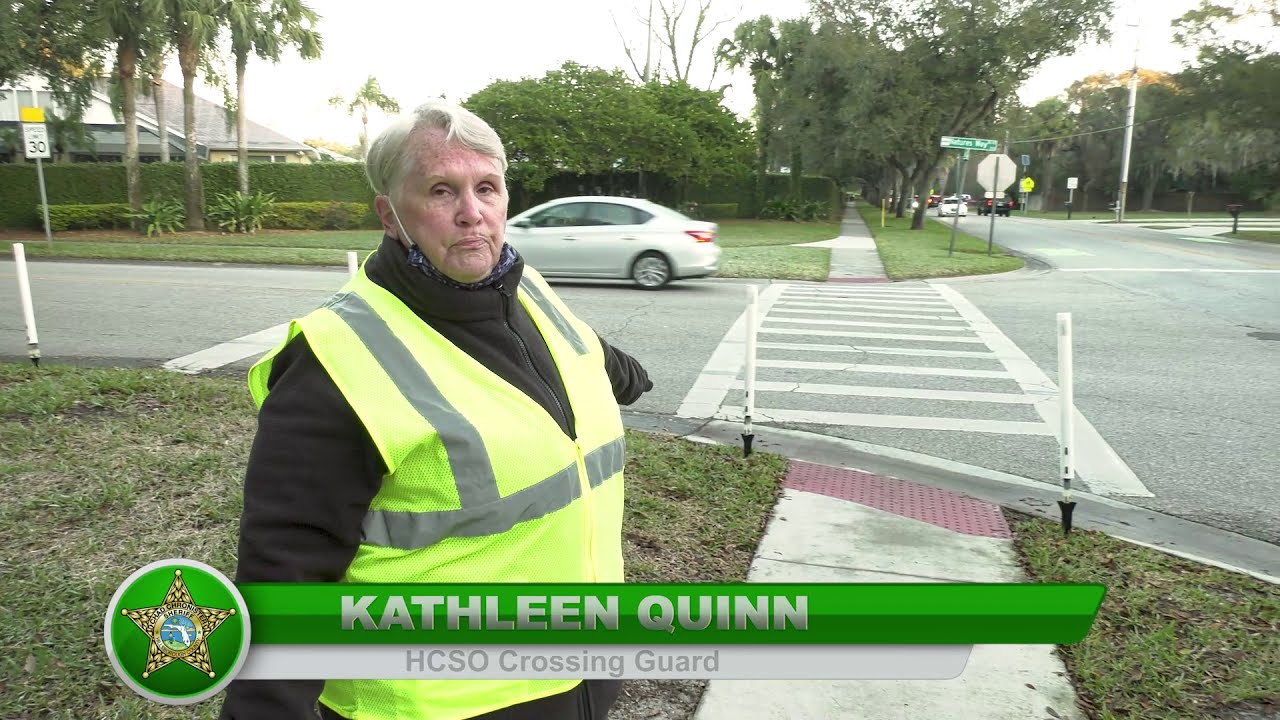 #teamHCSO Crossing Guard Saves Girl From Reckless Driver
