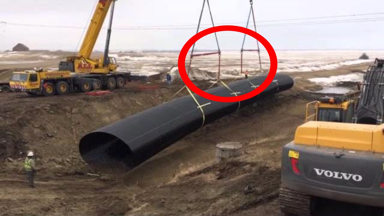 Mobile Crane lifting a Pipe into Position / Mobile Crane lifting / Mobile Crane working Mobile Crane