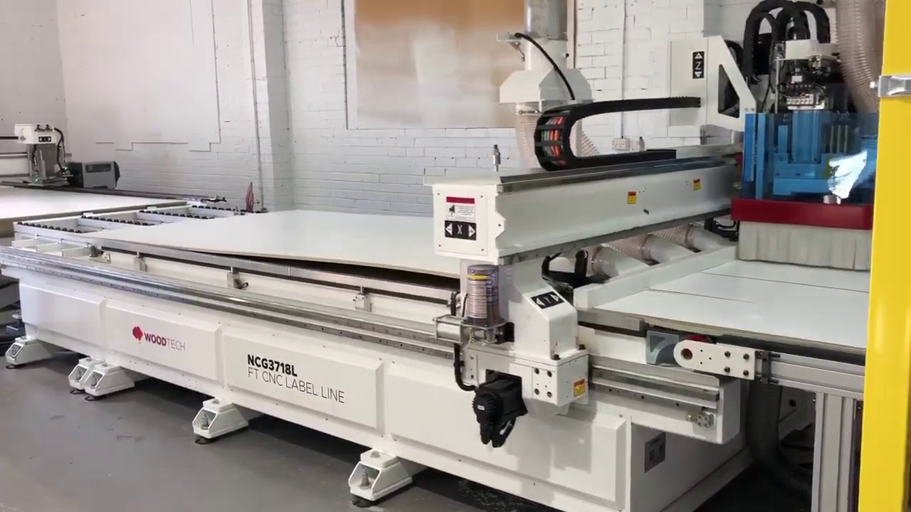 Wood Tech Flatbed CNC Nesting Machine with Label Line and Load/Unload. Model: NCG3718