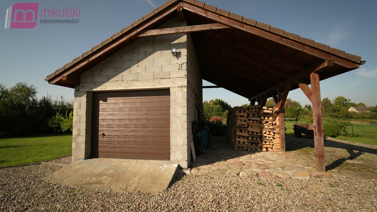 Dom na dużej działce ze stawem rybnym