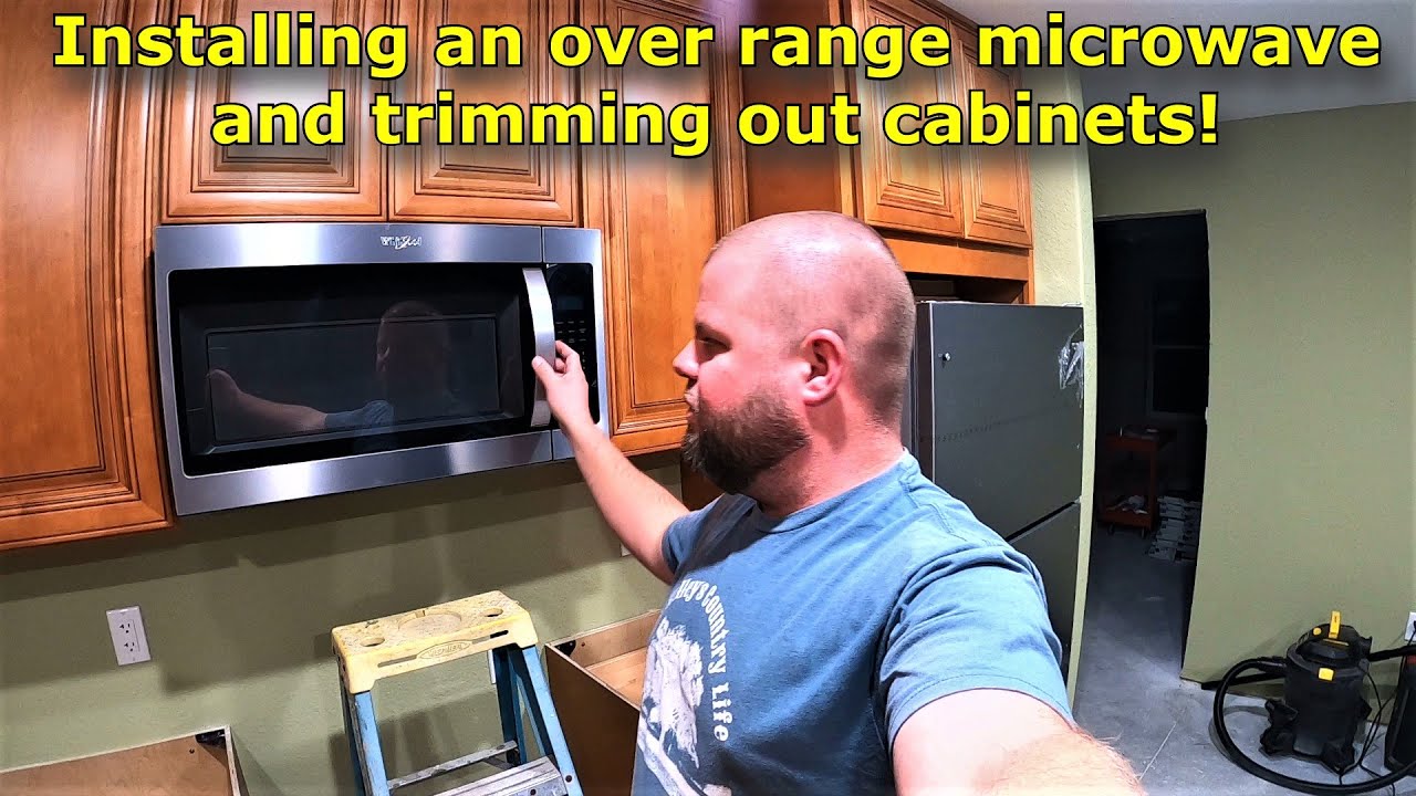 Installing an over range microwave and trimming out the kitchen cabinets! 
