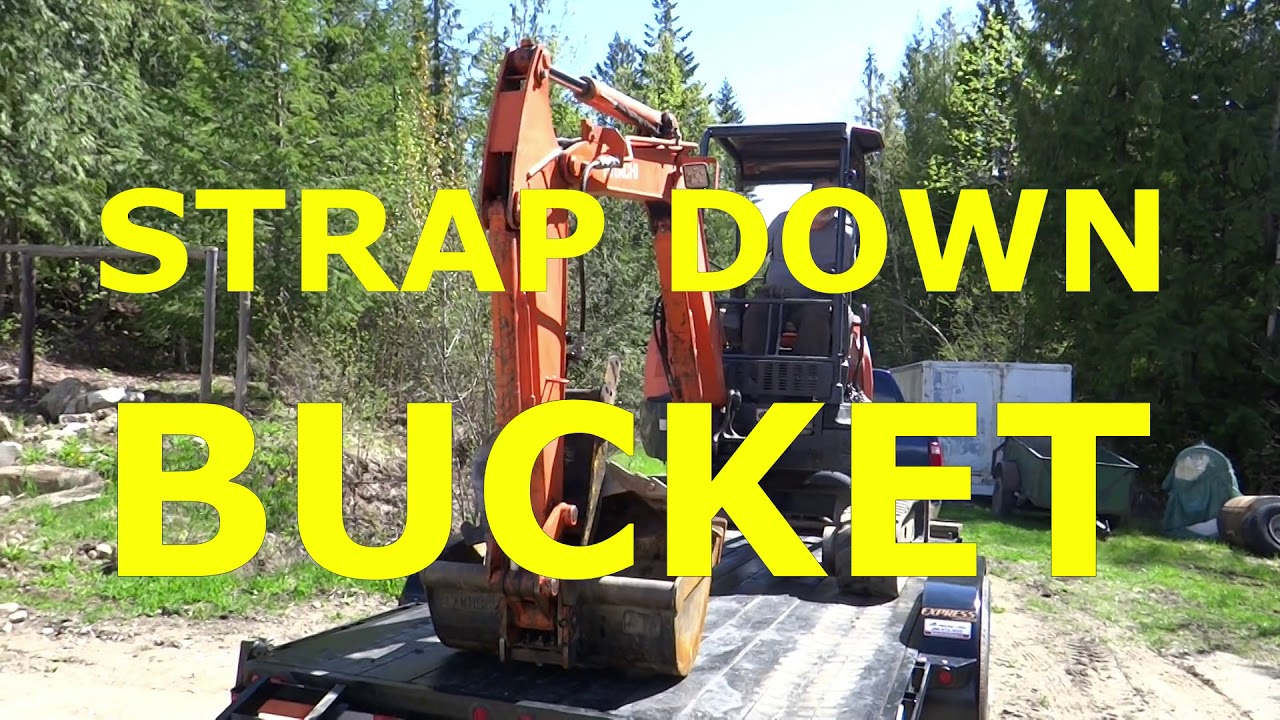 How to load and tie down my mini excavator on 18ft. Rainbow flat deck trailer.