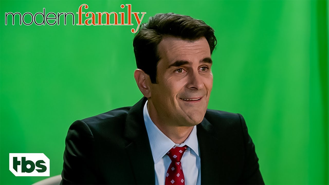 Phil Scrubs The Evidence from Cam & Mitch's Wedding Video (Clip) | Modern Family | TBS