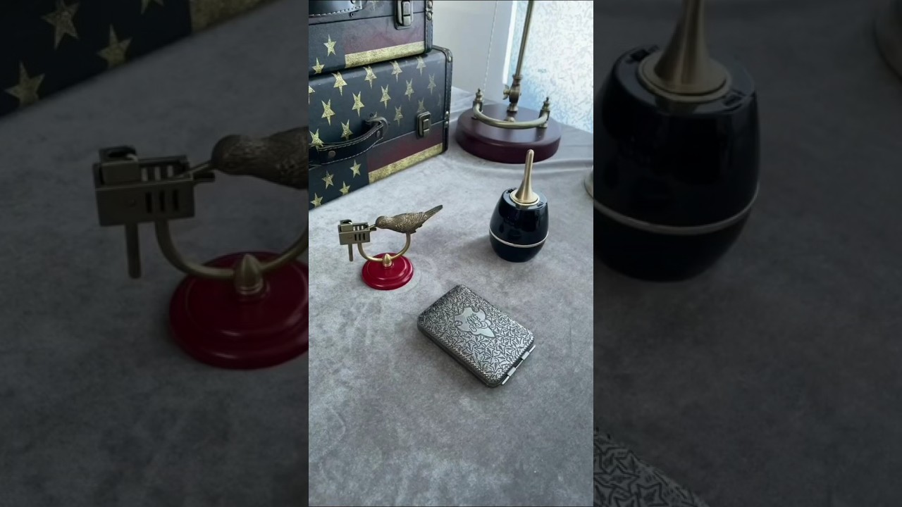 Bird lighter | silver case | black vase lighter