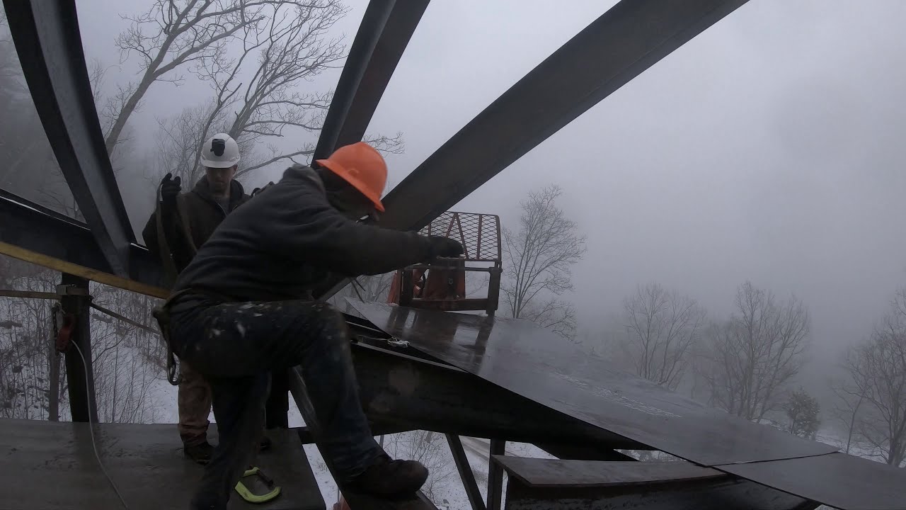 Andrew Camarata's  shipping container castle roof finished