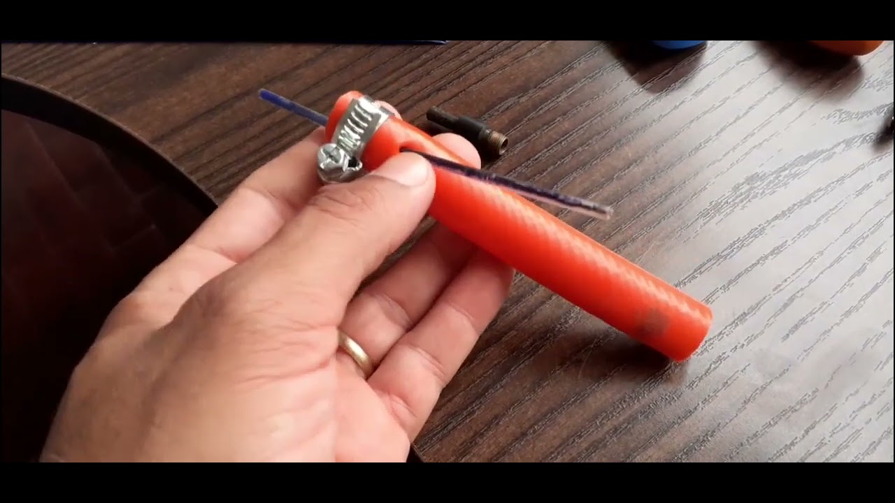 Como colocar água em pneu de trator simples e fácil.....