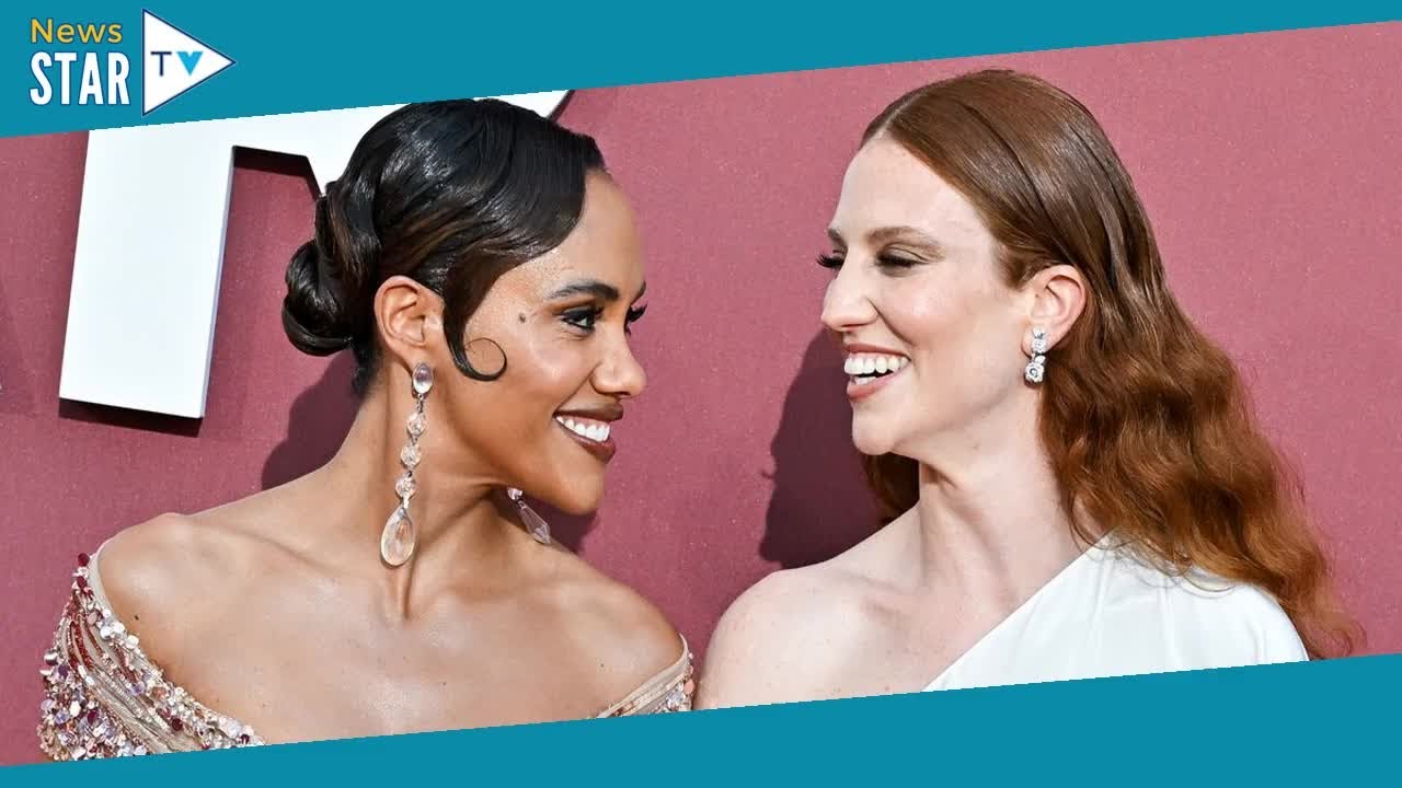 Alex Scott and Jess Glynne hold hands as they finally walk red carpet together