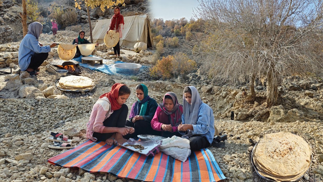 Iran Nomadic Life: Girls Making Traditional Local Bread by Their Stone House in Zagros
