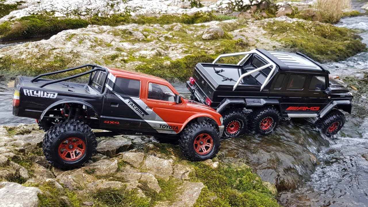 Axial SCX 10.2 Toyota Tacoma & TRX 6x6 AMG - on a trail