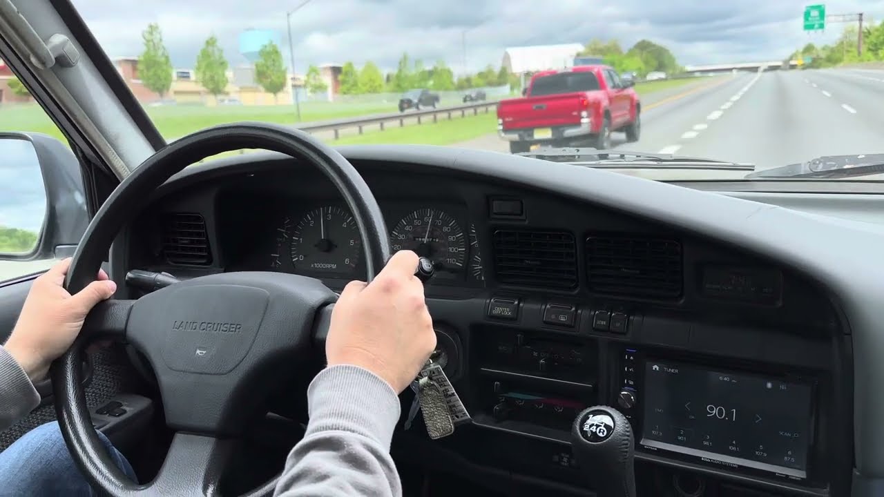 Driving Toyota Land Cruiser FJ80 with manual transmission on the highway