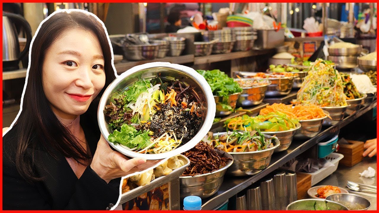 Eating Bibimbap, Korean Street Food at Gwangjang Traditional Market Seoul Korea