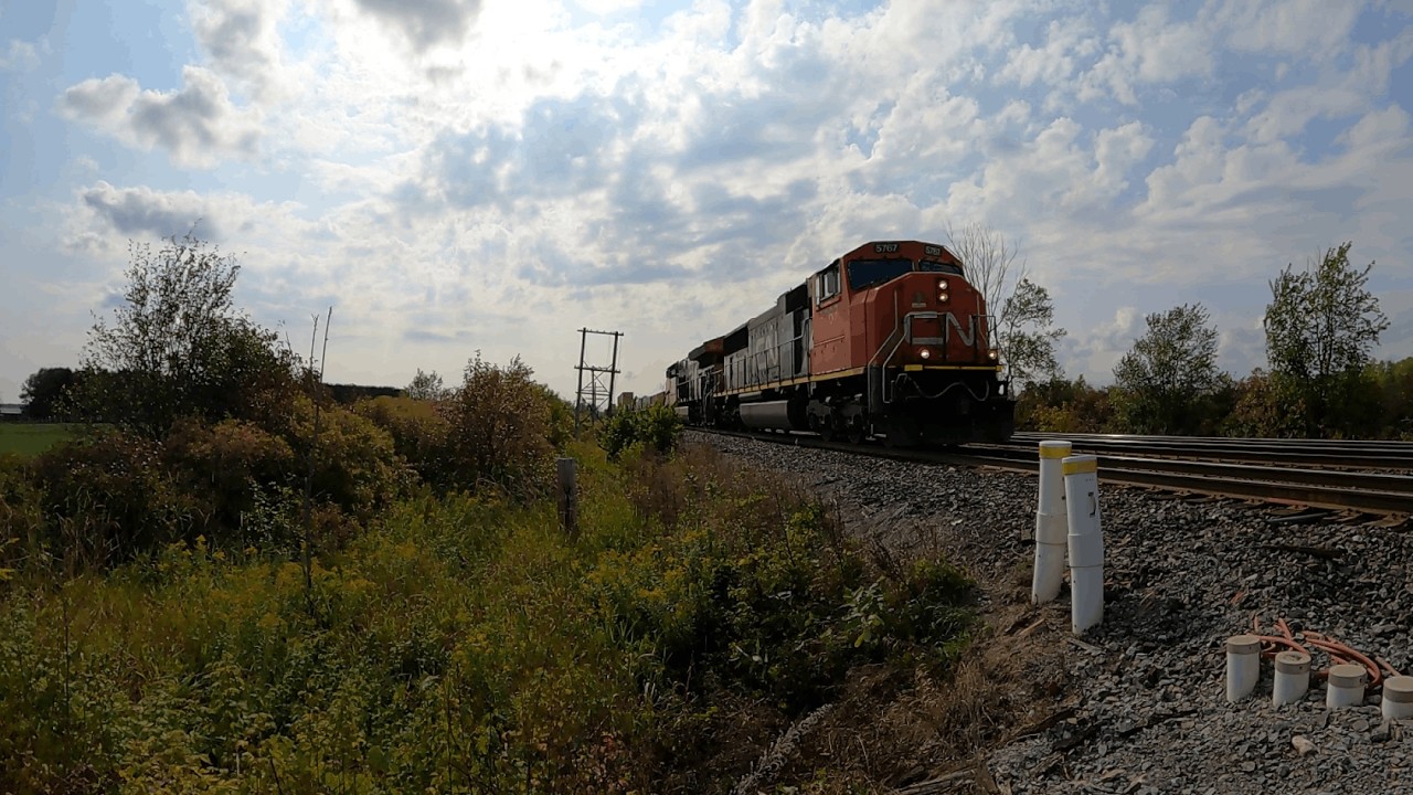 CN Z126 crawls by Kidd road.