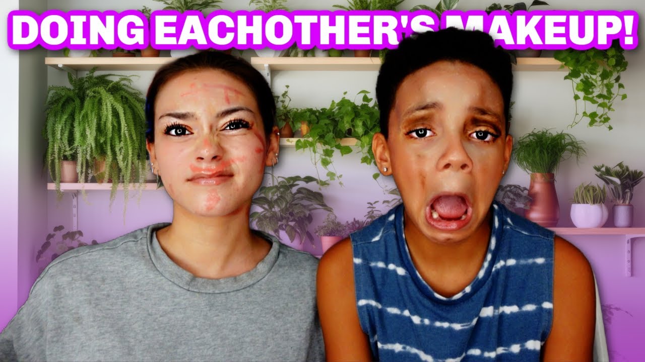Letting my brother do my makeup!